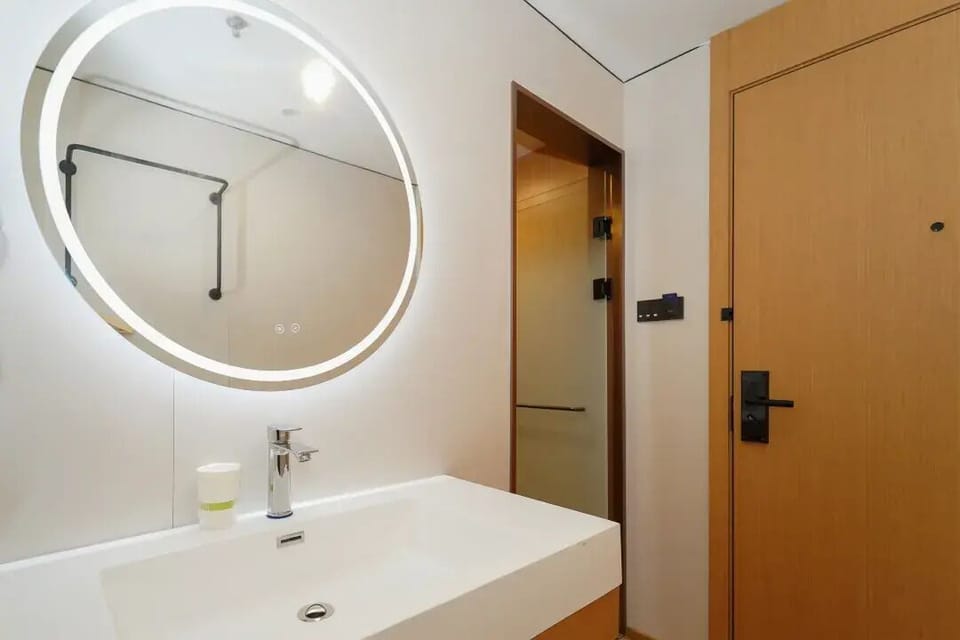 Shower, hair dryer, towels, shampoo