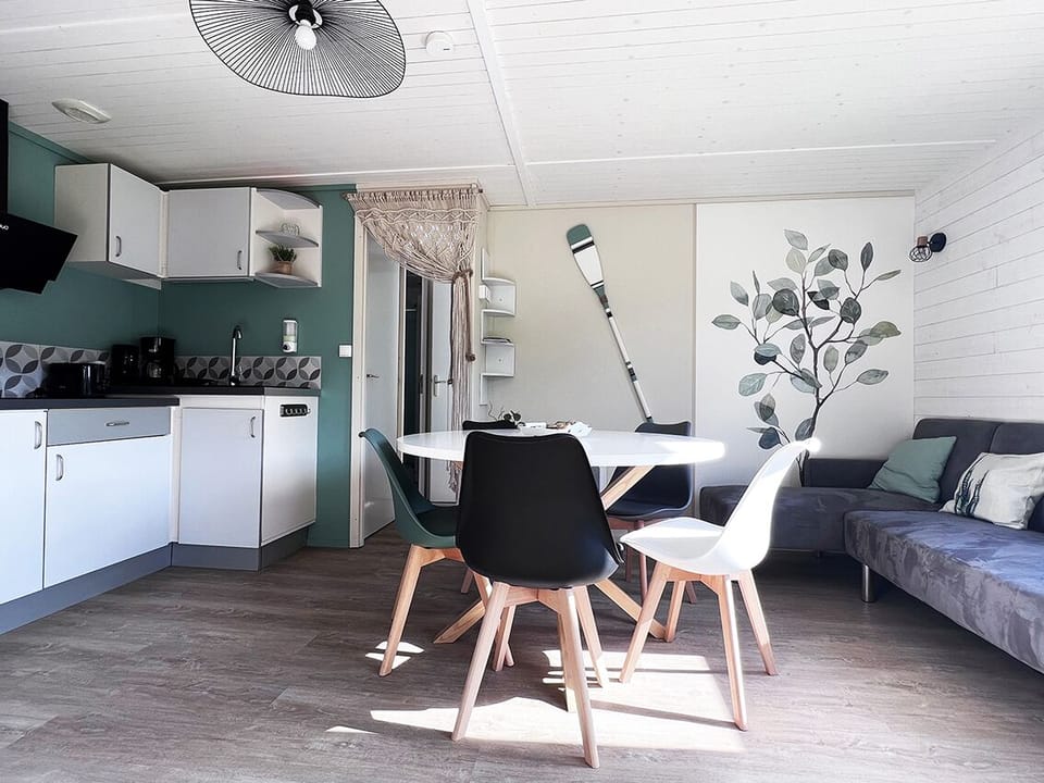 Flat-screen TV, foosball, table tennis, books