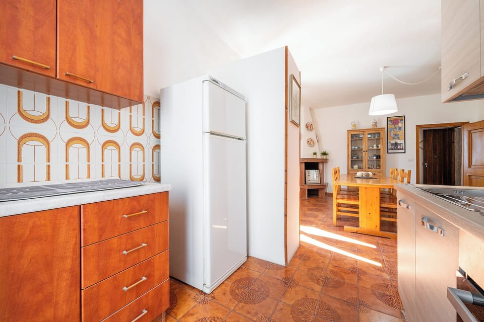 Apartment, 3 Bedrooms | Private kitchen | Full-size fridge, oven, stovetop, cookware/dishes/utensils