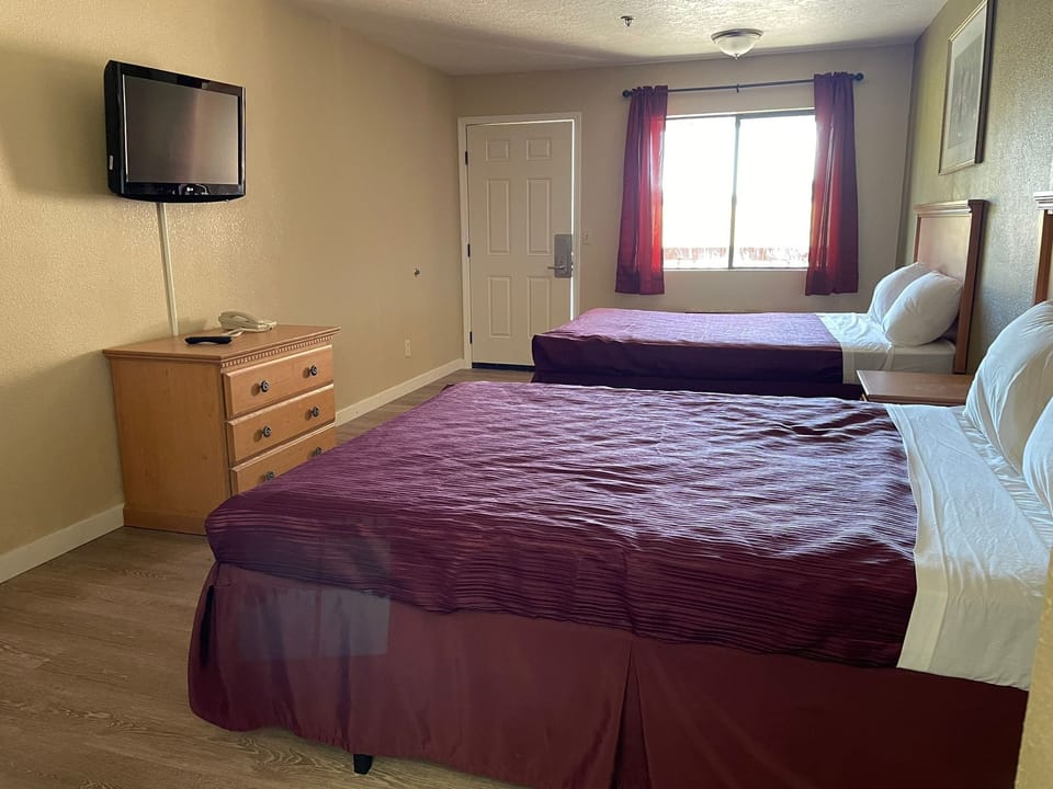 Standard Room, 2 Queen Beds, Refrigerator & Microwave | Individually furnished, desk, blackout drapes, free WiFi