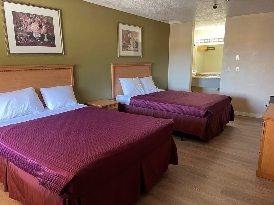 Standard Room, 2 Queen Beds, Refrigerator & Microwave | Individually furnished, desk, blackout drapes, free WiFi