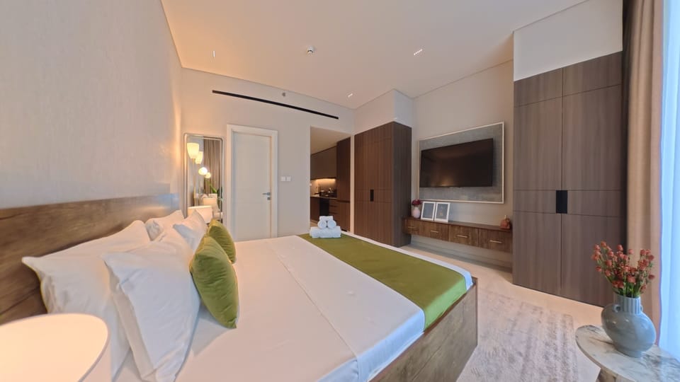 Apartment, 1 King Bed, Pool View | Iron/ironing board, free WiFi