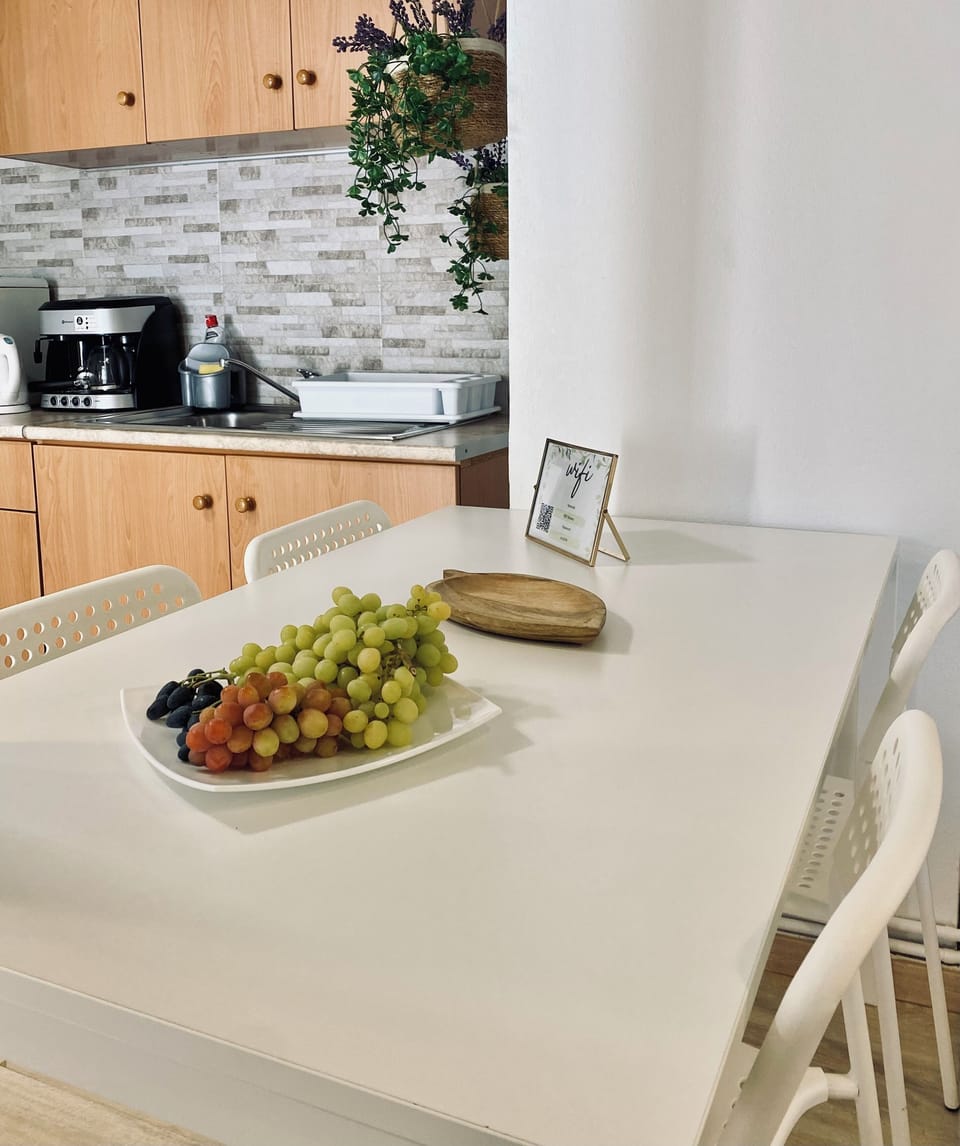 Comfort Quadruple Room, Garden View | Private kitchen | Espresso maker, coffee/tea maker, electric kettle, highchair