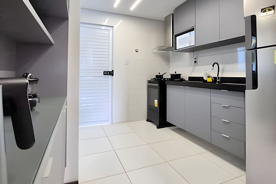 Apartment | Private kitchen | Fridge, microwave, cookware/dishes/utensils