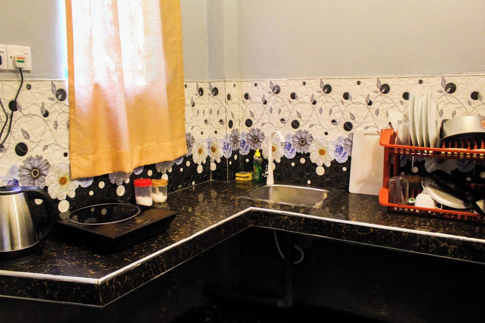 Family Room, Garden View | Private kitchen | Mini-fridge, toaster, blender, mixer
