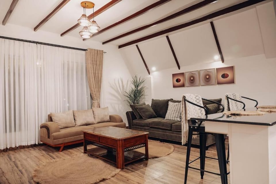 Family Suite, Balcony, Valley View | Living area | TV