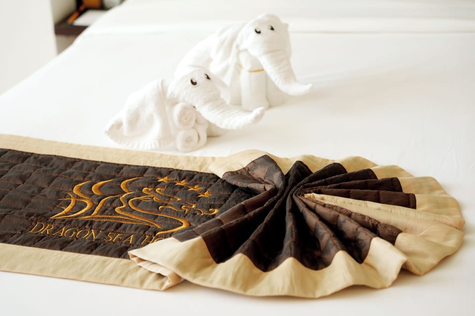 Deluxe Room (City & Sea) | Minibar, desk, blackout drapes, soundproofing