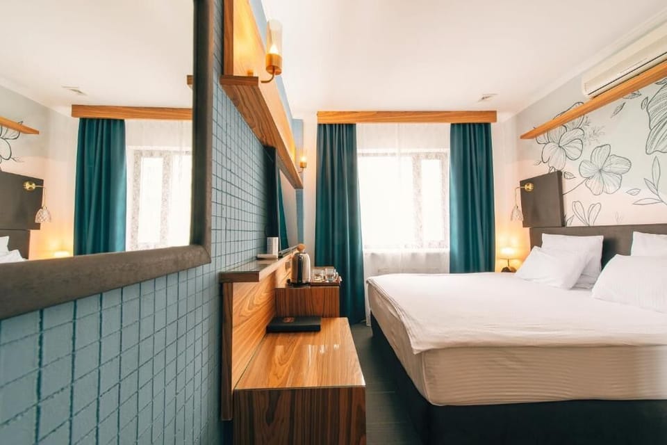 Standard Double Room | Blackout drapes, iron/ironing board (on request), WiFi (free)