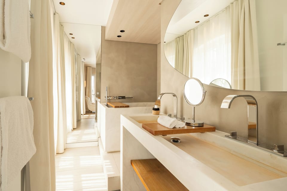 Designer toiletries, hair dryer, bathrobes, slippers