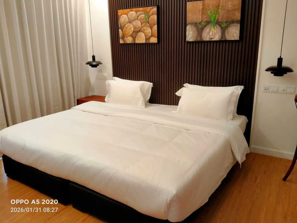 Deluxe Double Room, Balcony | In-room safe, desk, laptop workspace, iron/ironing board