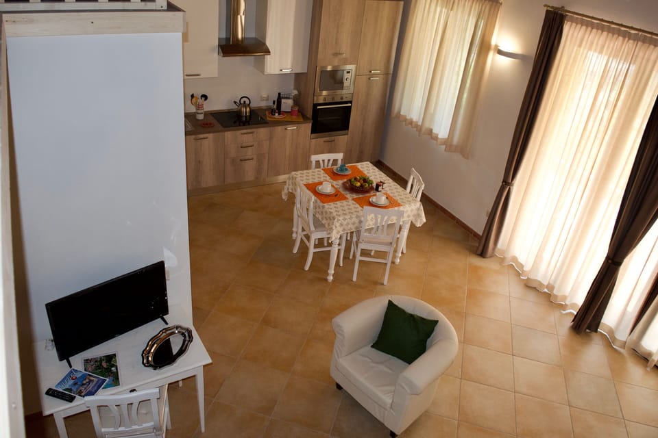 Design Apartment, Patio, Courtyard View | Living area | TV