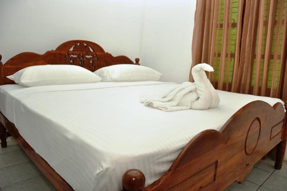 Deluxe Double Room, Balcony, Garden View | In-room safe, desk, laptop workspace, blackout drapes