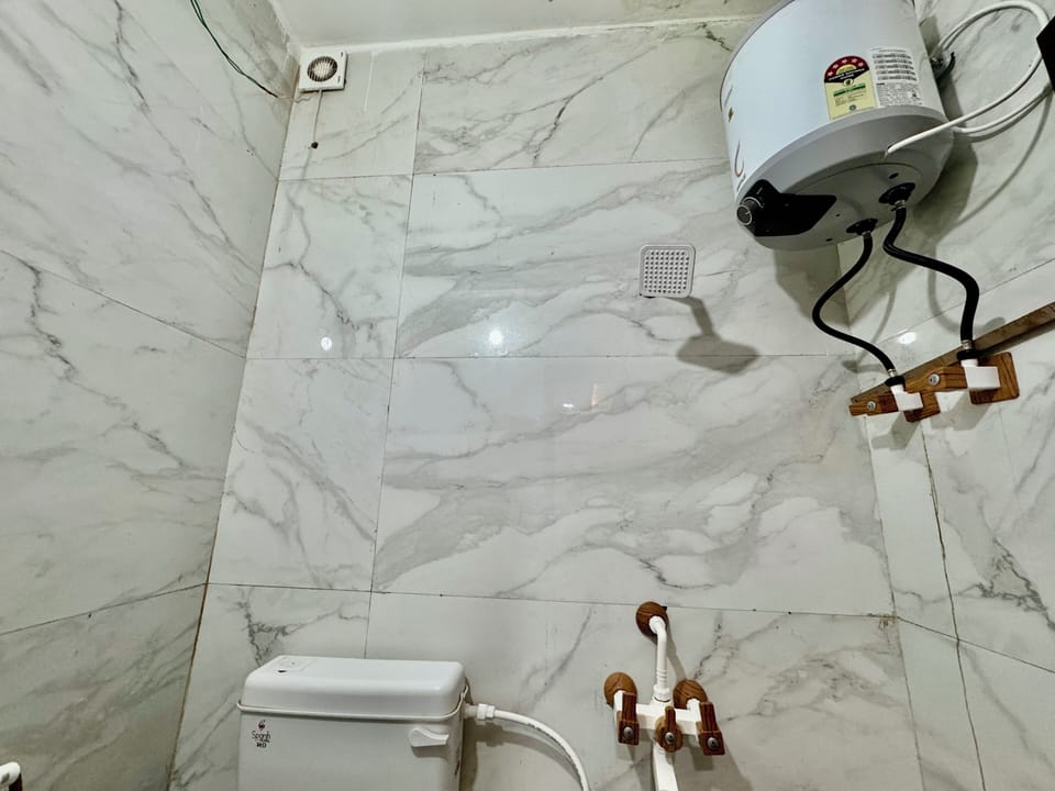 Shower, towels, soap, toilet paper