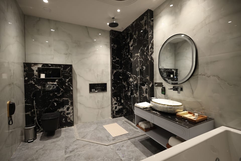 Superior Twin Room | Bathroom | Shower, hair dryer, slippers, towels