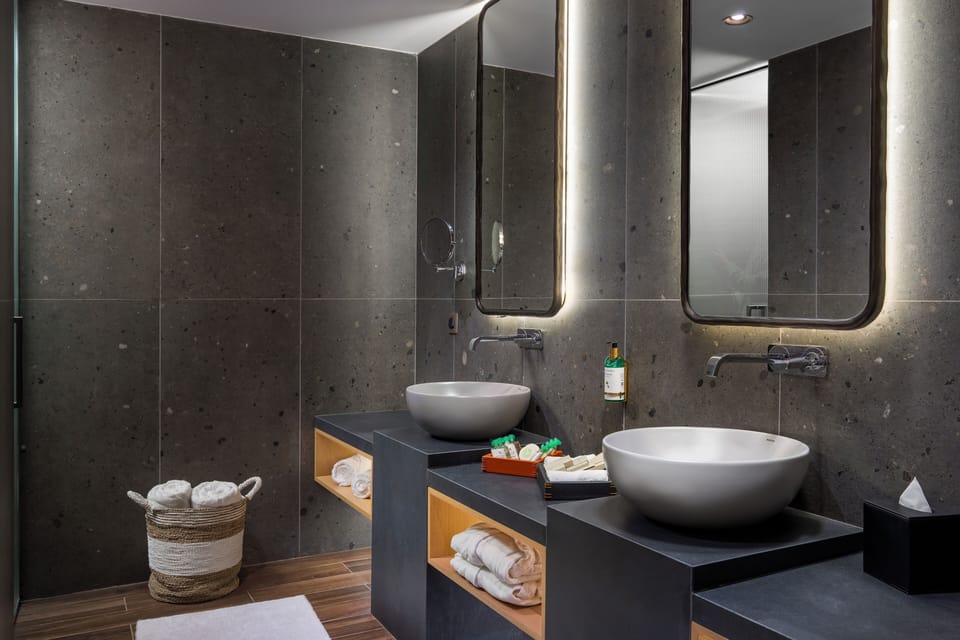 Lovinn Terrace | Bathroom | Shower, designer toiletries, hair dryer, bathrobes