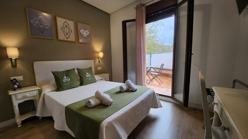 Standard Double Room, Balcony, Garden View | In-room safe, soundproofing, free WiFi
