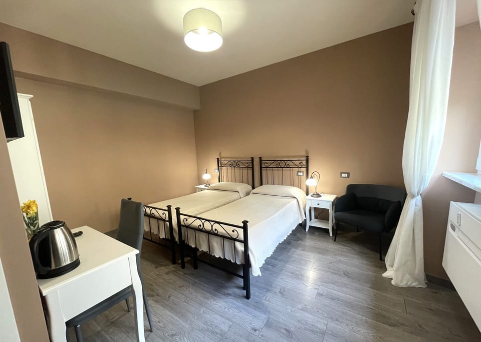 Standard Double or Twin Room, City View | In-room safe, desk, soundproofing, iron/ironing board