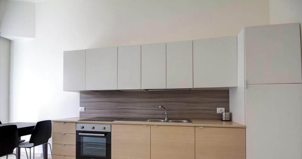 Superior Apartment | Private kitchen | Full-size fridge, stovetop, cookware/dishes/utensils