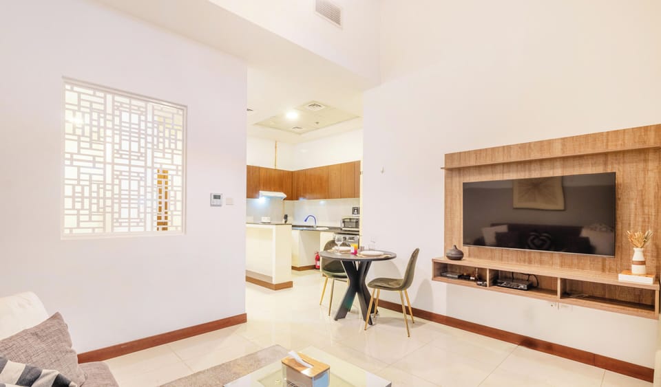 Luxury Studio | Living area | Flat-screen TV
