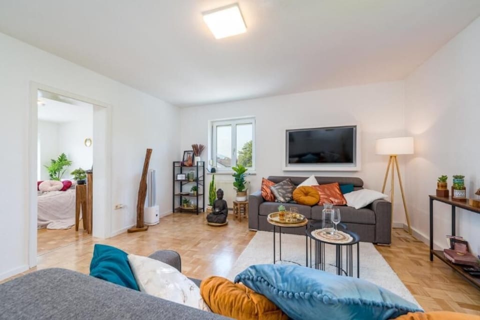 Apartment, Balcony, Garden View | Living area | Flat-screen TV