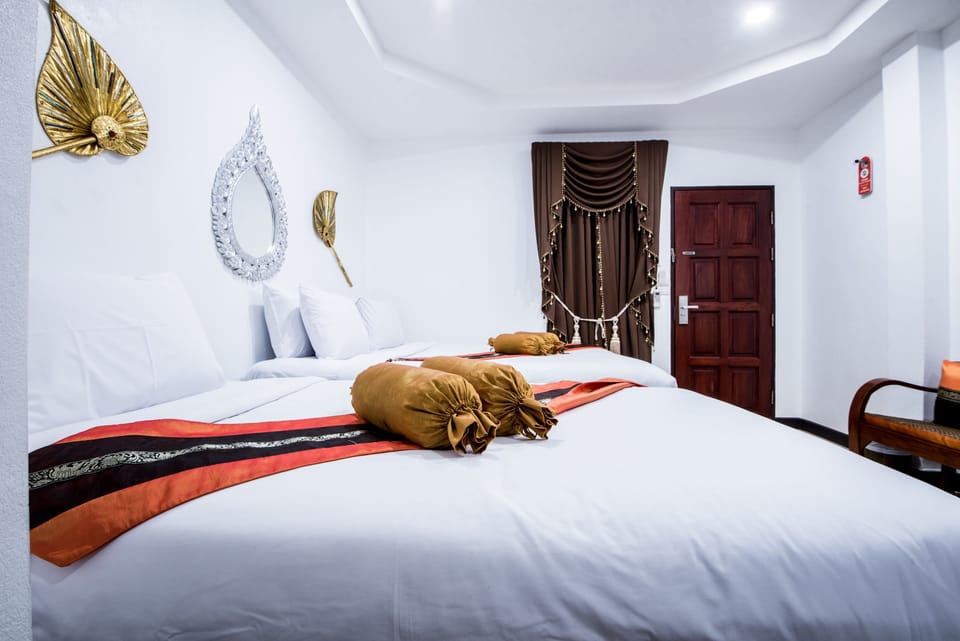 Standard Triple Room, 1 Bedroom | In-room safe, desk, blackout drapes, soundproofing