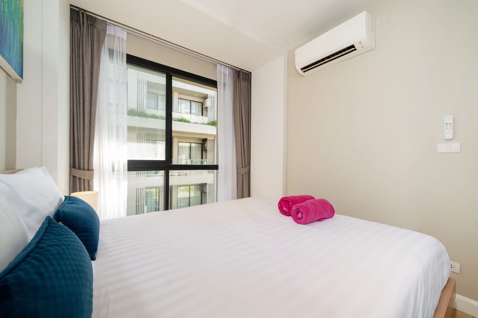 Deluxe Apartment, 2 Bedrooms, Balcony | In-room safe, blackout drapes, iron/ironing board