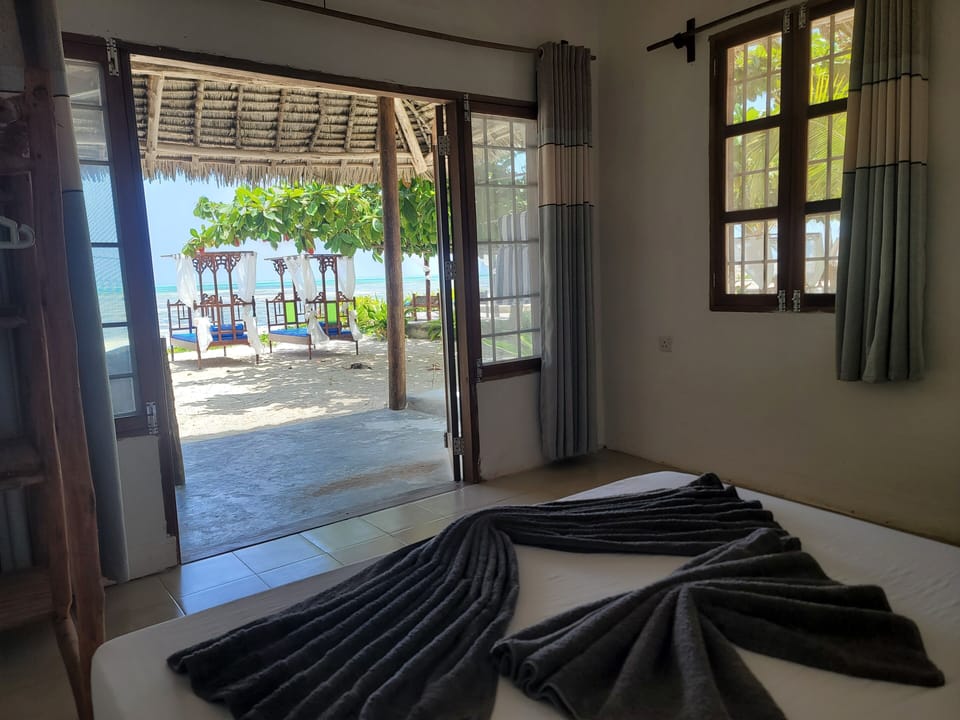 Classic Double Room, 1 Double Bed, Terrace, Beach View | In-room safe, individually decorated, individually furnished