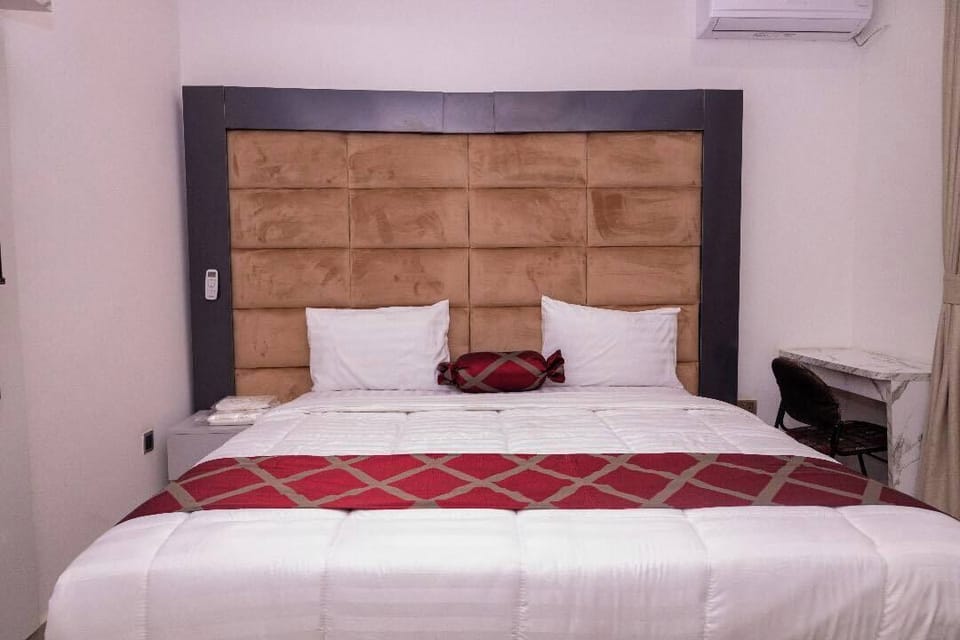 Junior Room, Balcony, City View | Desk, laptop workspace, blackout drapes, soundproofing