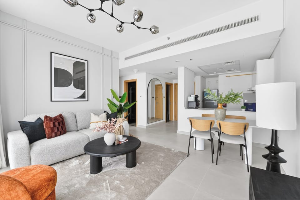 Elite Apartment, 2 Bedrooms (Apartment) | Living area | 50-inch Smart TV with digital channels