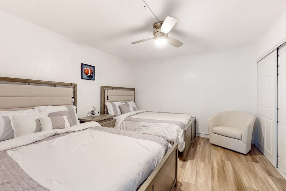 House, Multiple Beds, Balcony, Beach View (Daytona Hawaiian Inn 431) | 2 bedrooms, individually decorated, individually furnished, bed sheets