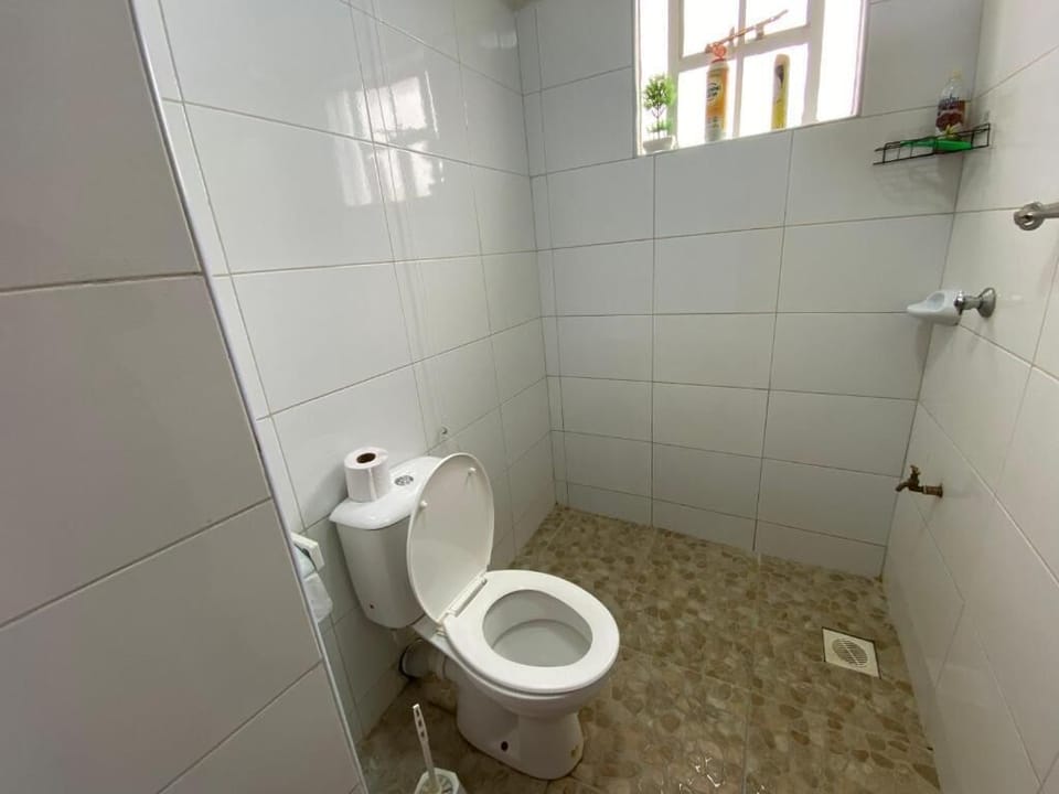 Shower, free toiletries, slippers, towels
