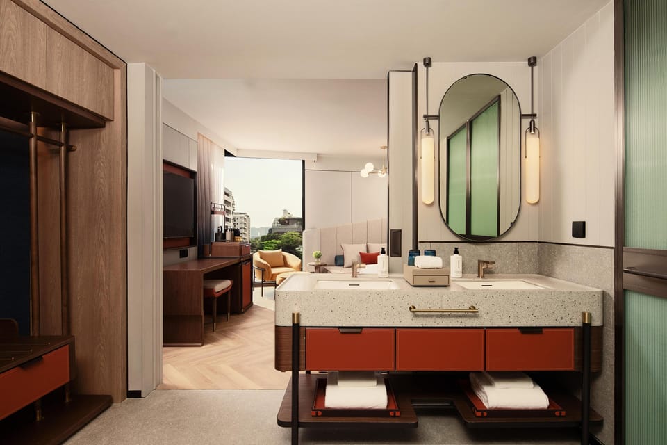 King Canopy Corner Room | Bathroom | Free toiletries, hair dryer, bathrobes, slippers