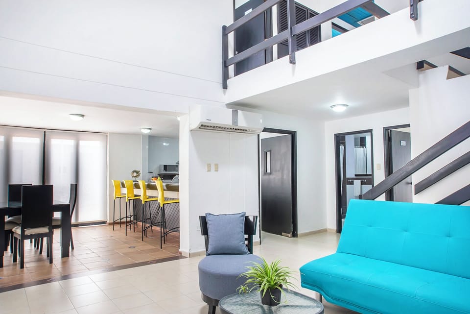 Family Villa | Living area | 32-inch TV with cable channels