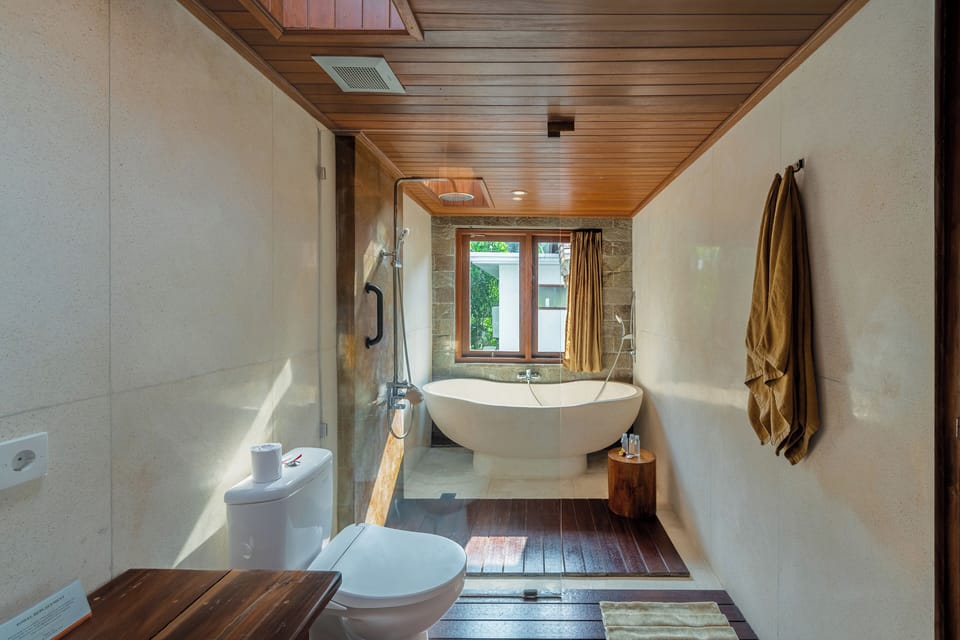 Deluxe Double Room, Balcony, Pool View | Bathroom | Separate tub and shower, hair dryer, towels, soap