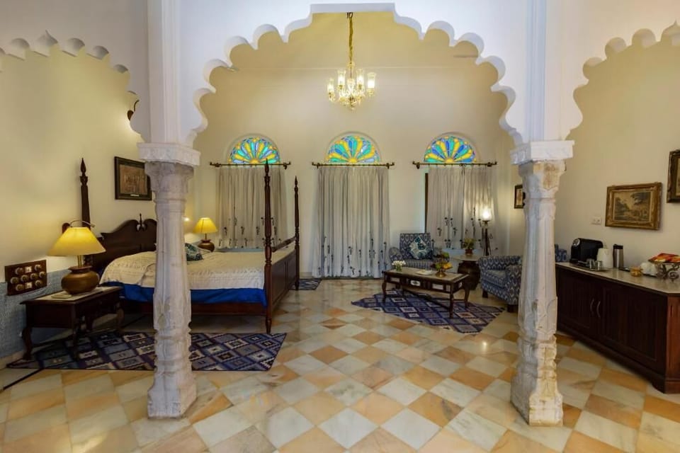 Deluxe Suite, Balcony, Courtyard View | In-room safe, soundproofing, iron/ironing board, WiFi (free)