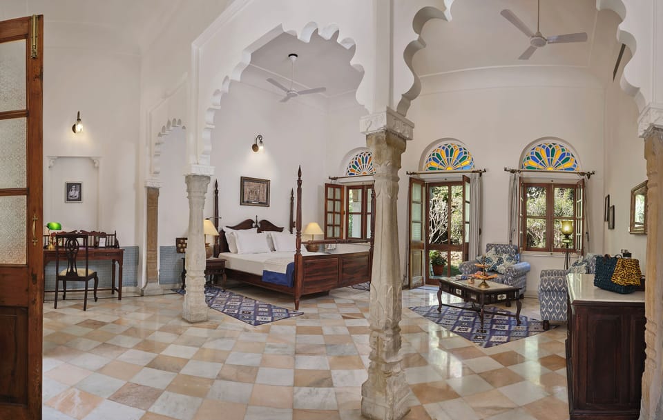 Deluxe Suite, Balcony, Courtyard View | In-room safe, soundproofing, iron/ironing board, WiFi (free)