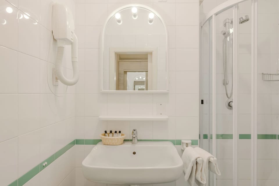 Standard Triple Room, Balcony | Bathroom | Free toiletries, hair dryer, towels, toilet paper