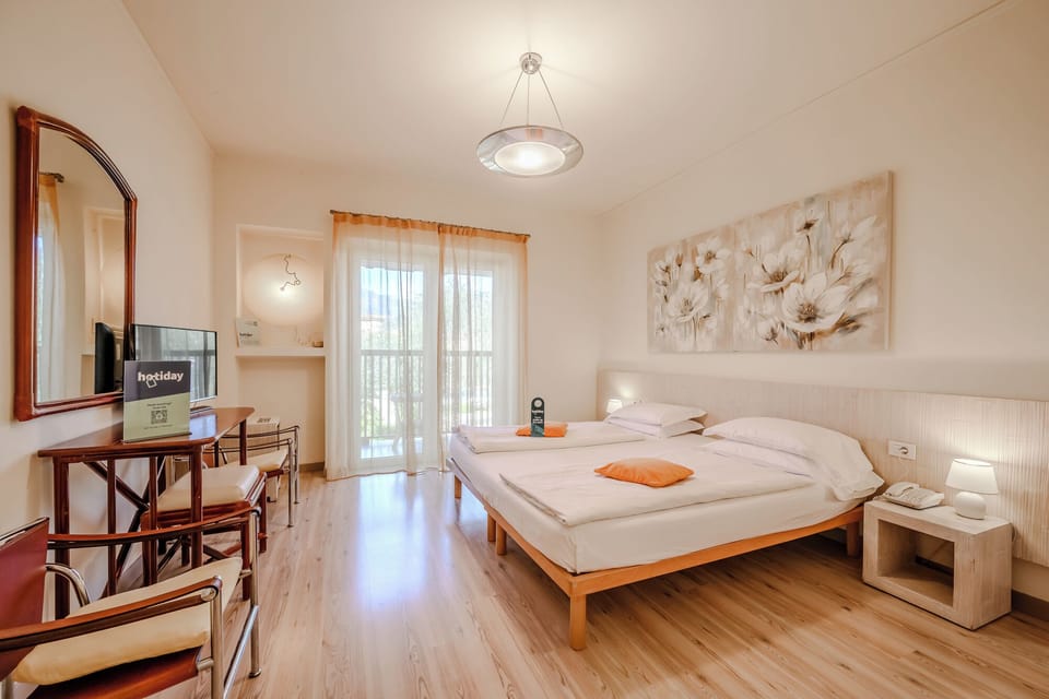 Standard Double Room, Balcony | In-room safe, desk, free WiFi