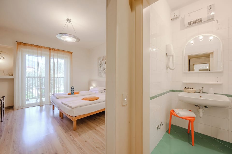 Standard Double Room, Balcony | In-room safe, desk, free WiFi