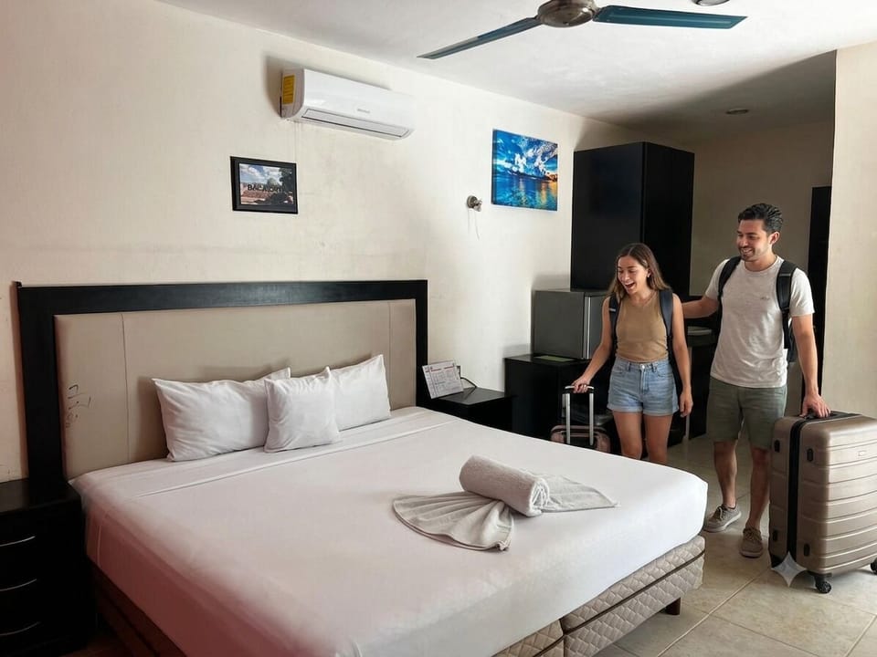 Superior Room, 1 King Bed, Refrigerator, Ground Floor | Iron/ironing board, WiFi (free), bed sheets