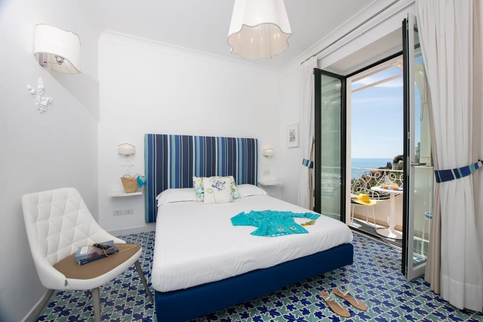 Comfort Room, Balcony, Sea View | In-room safe, free WiFi