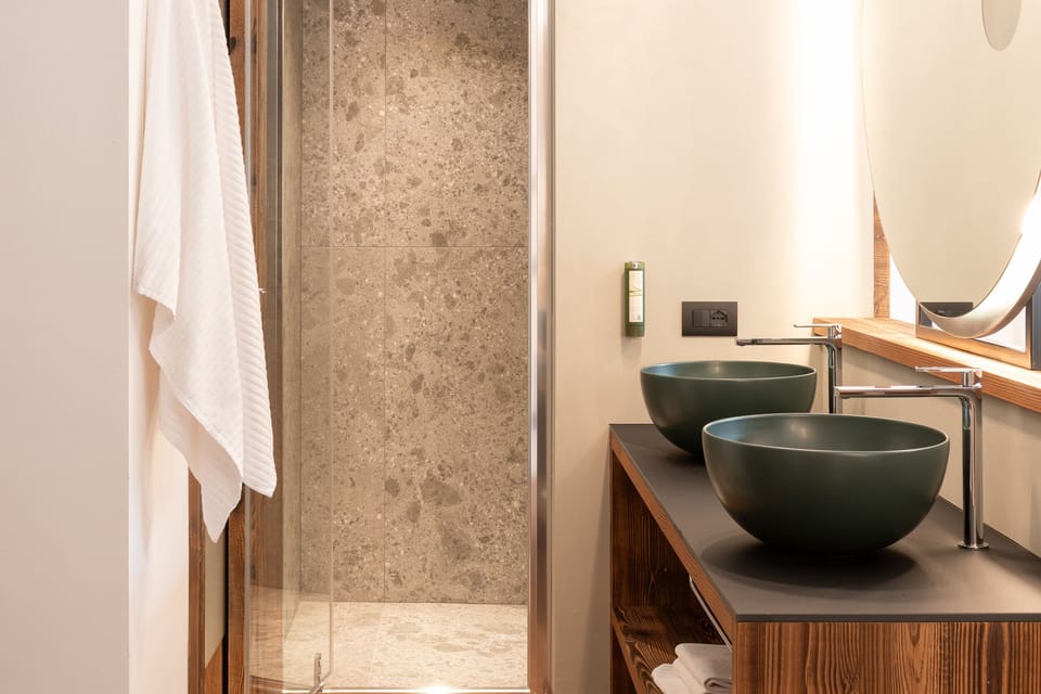 Suite, Hot Tub | Bathroom | Shower, hair dryer, bathrobes, slippers