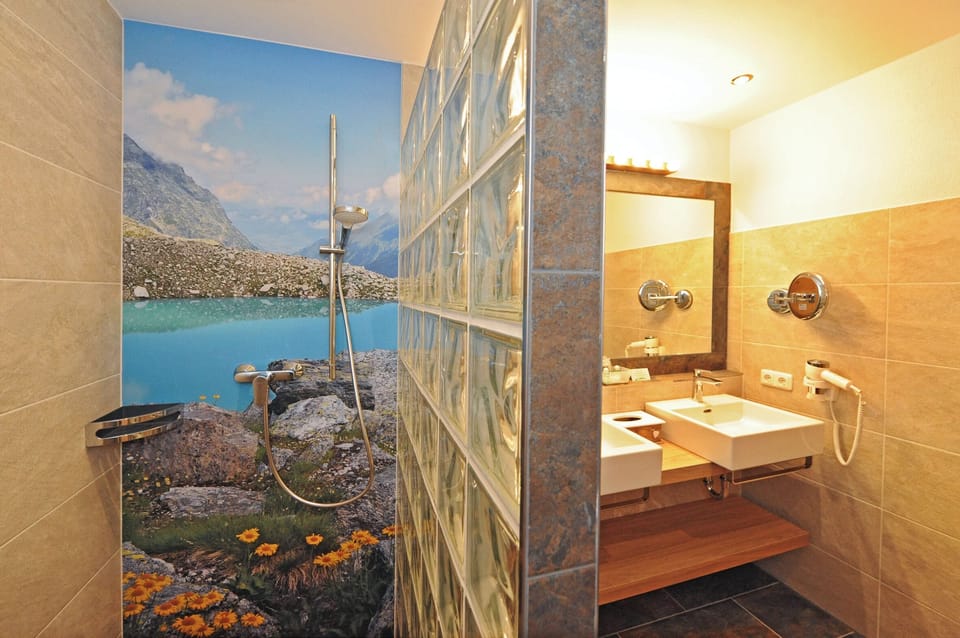 Shower, free toiletries, hair dryer, bathrobes