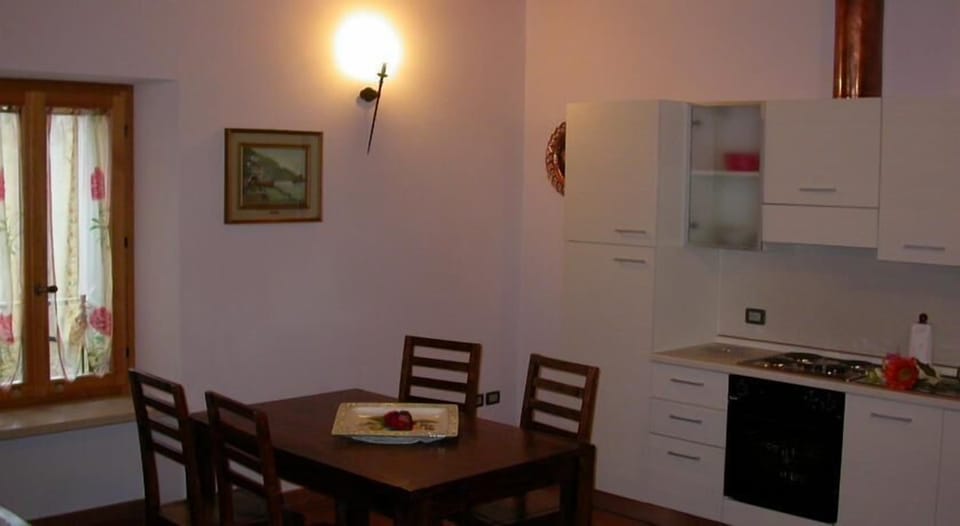 Apartment | Private kitchen | Full-size fridge, oven, stovetop, coffee/tea maker