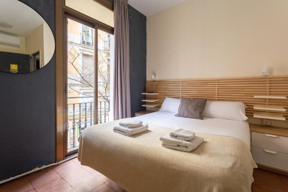 Triple Room, Balcony | Blackout drapes, free WiFi, bed sheets