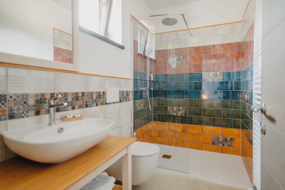 Standard Double Room | Bathroom | Shower, free toiletries, hair dryer, slippers