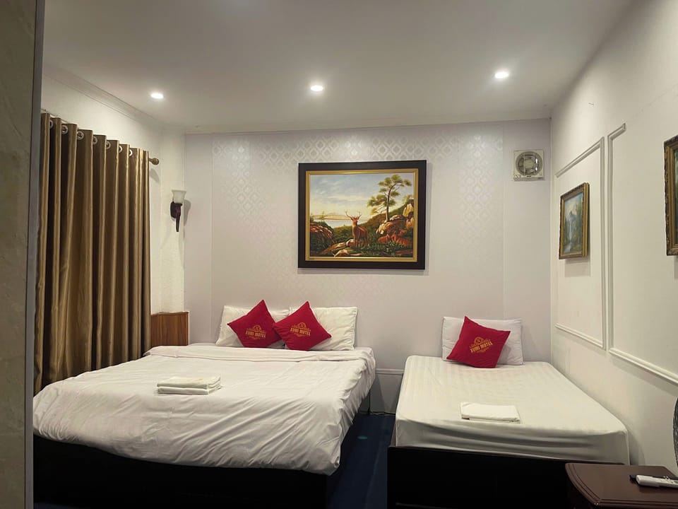 Family Triple Room | Blackout drapes, soundproofing, iron/ironing board, free WiFi