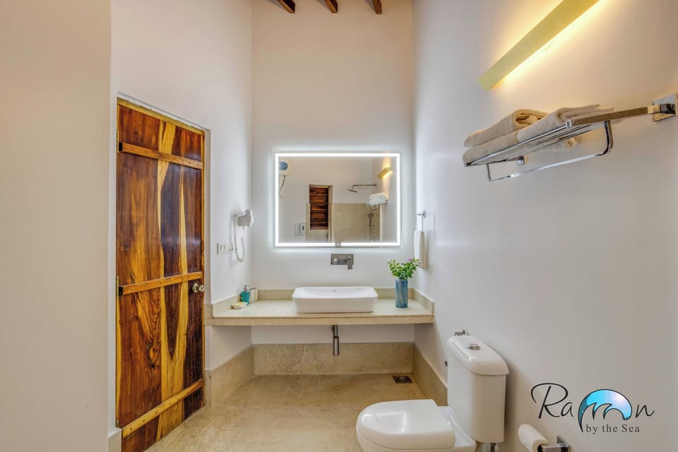Beach Villa 1 | Bathroom | Shower, free toiletries, towels, soap