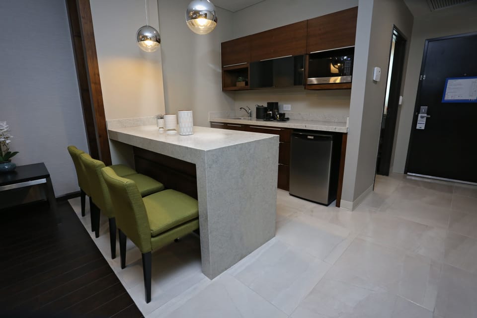 Suite, 1 King Bed (Additional Living Area) | In-room safe, desk, iron/ironing board, free WiFi