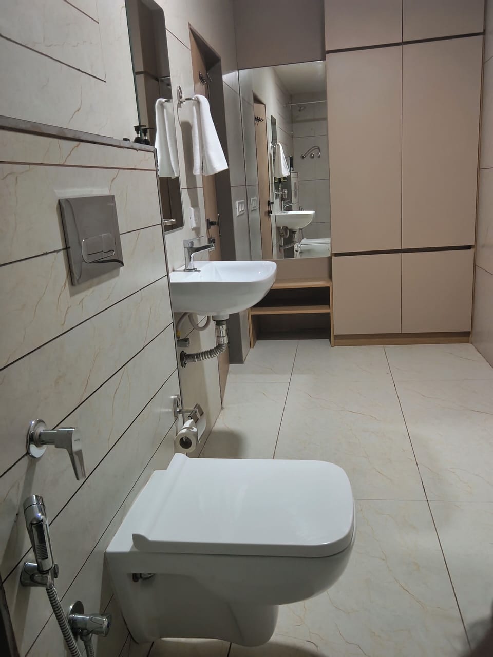 Shower, towels, soap, toilet paper